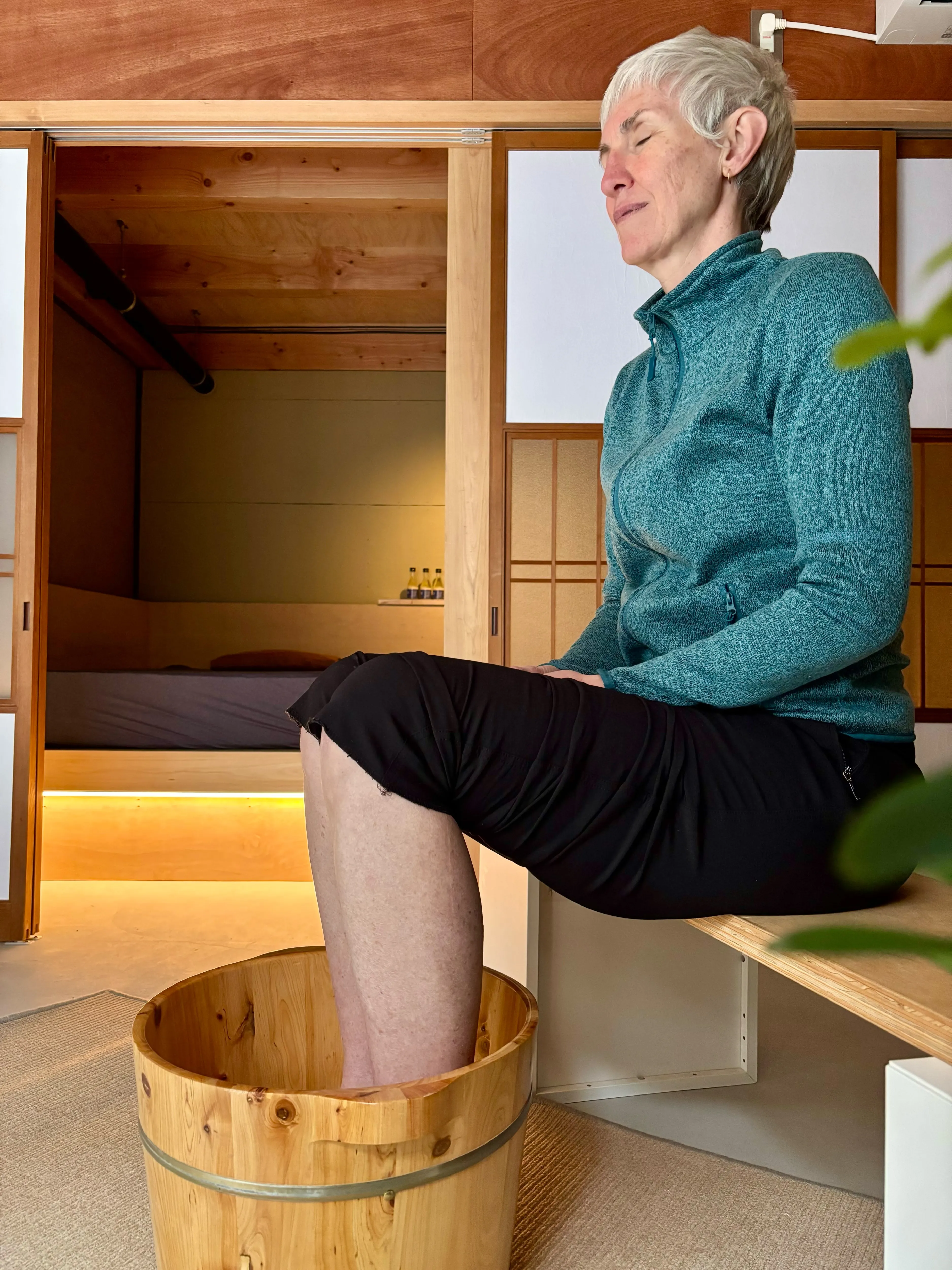 Herbal foot bath with flower petals